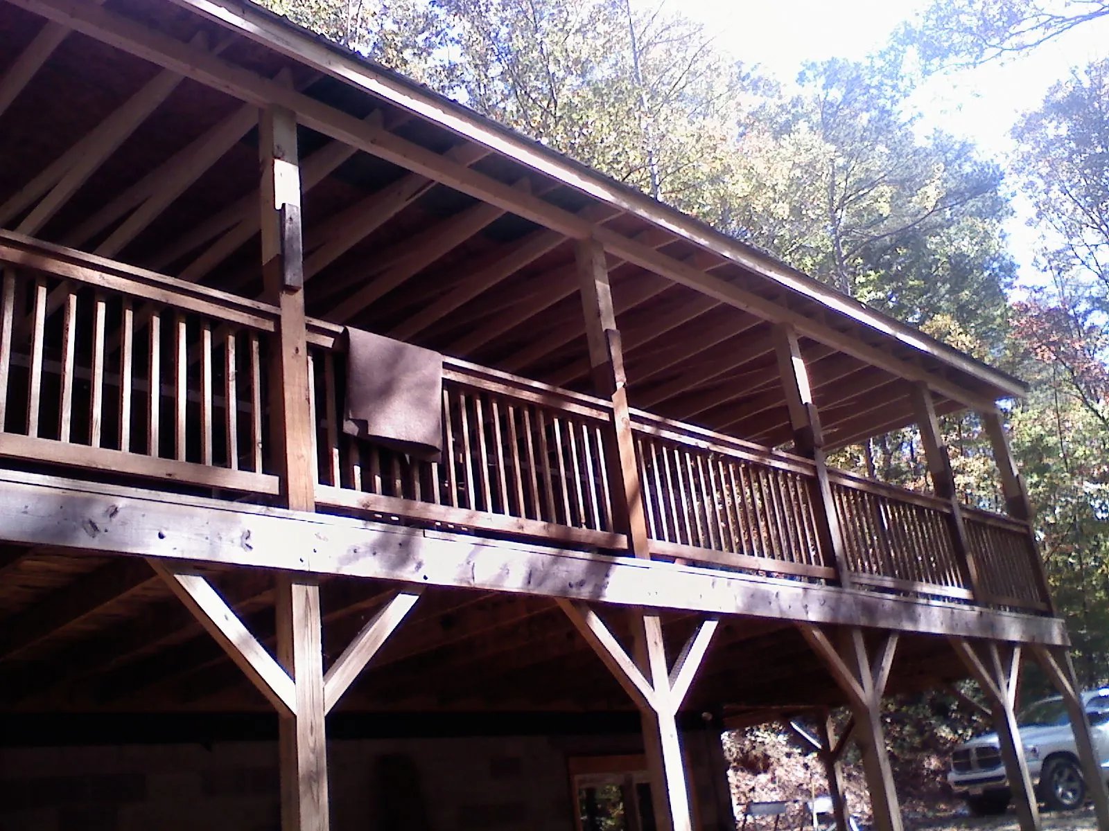 Timber framing under a new elevated porch and deck — Roof Leak Repair in Walling by Roofing Brothers